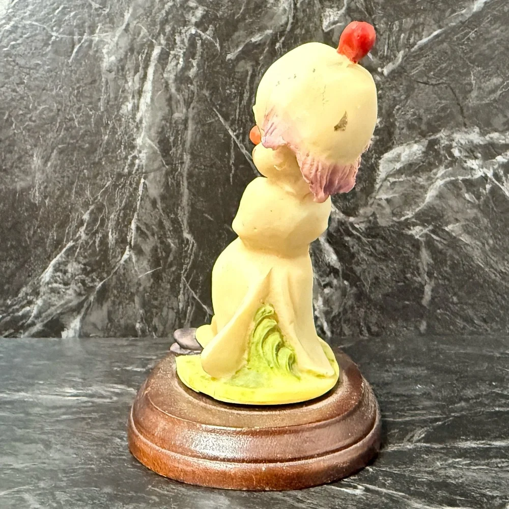Dentist Clown Pulling Rabbits Tooth Figurine